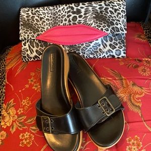 Topic of discussion a buckled slip on sandals!